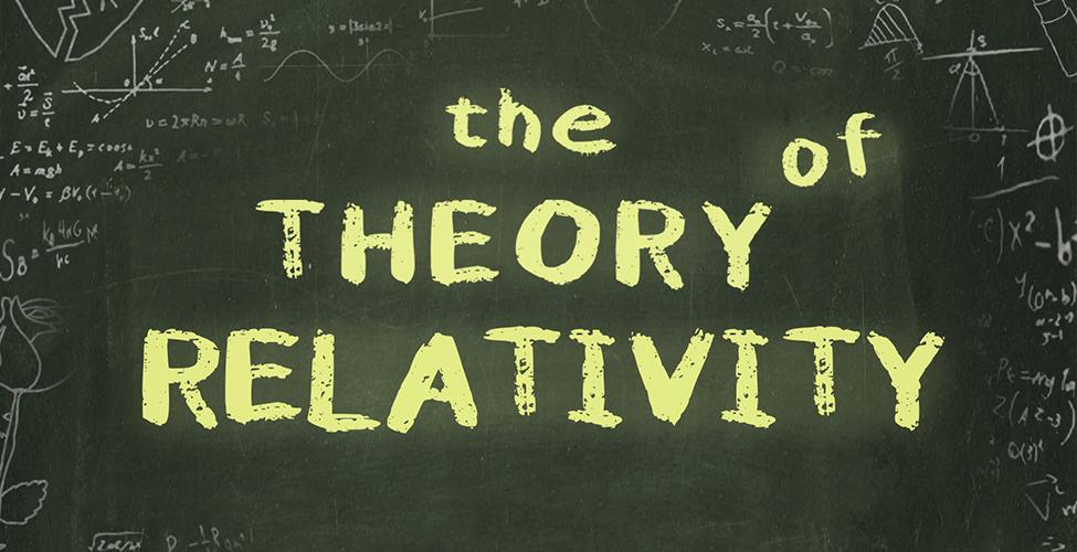 The Theory of Relativity written on a chalkboard with math equations and graphs.