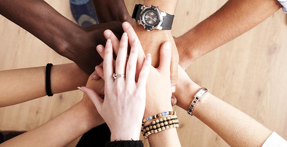 Group with hands together