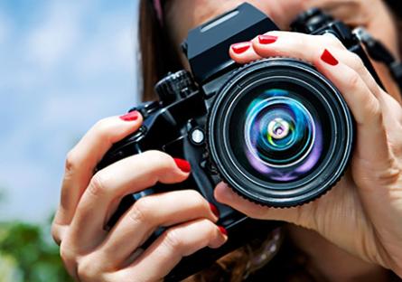 Student holding a camera.