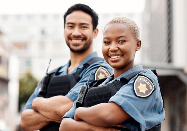 Smiling college police officers